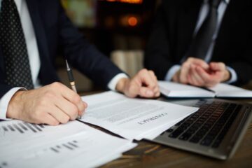 businessman-reading-contract-closeup-1-1.jpg
